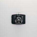 Antique Pronto camera captured in a classic flat lay style on a white background.